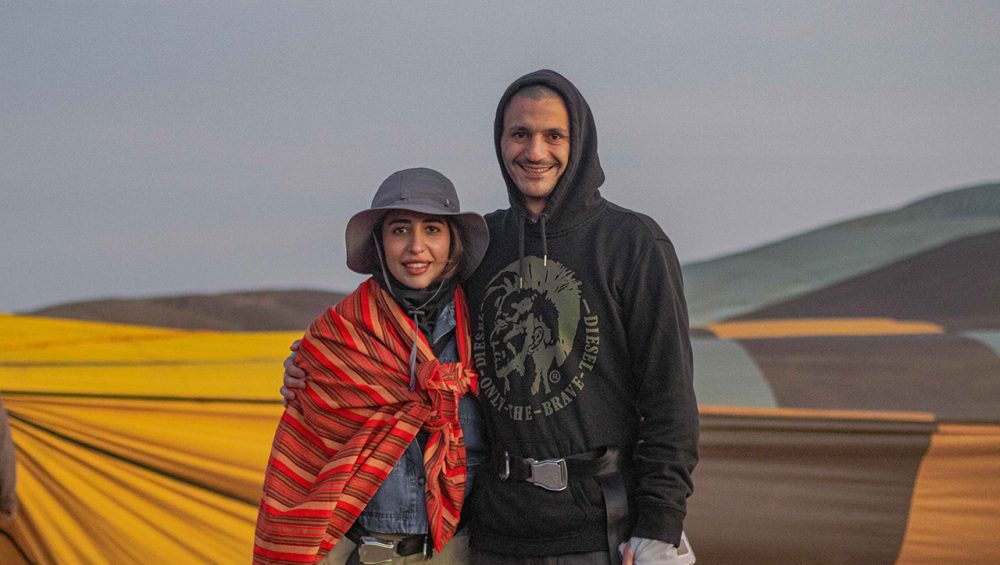 Honeymooners booked a luxury safari with Nihapa Tours, waiting for a sunrise hot air balloon ride over the Serengeti, showcasing how to plan a luxury safari in Tanzania.