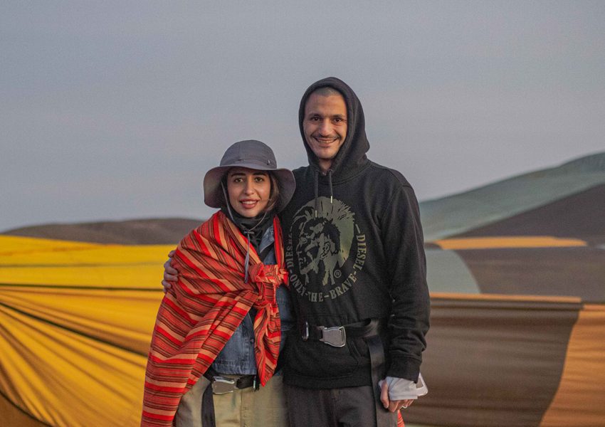 Honeymooners booked a luxury safari with Nihapa Tours, waiting for a sunrise hot air balloon ride over the Serengeti, showcasing how to plan a luxury safari in Tanzania.