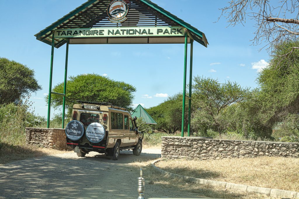 Nihapa Tours safari vehicle at the entry gate of Tarangire National Park — the start of an unforgettable Tanzania safari experience