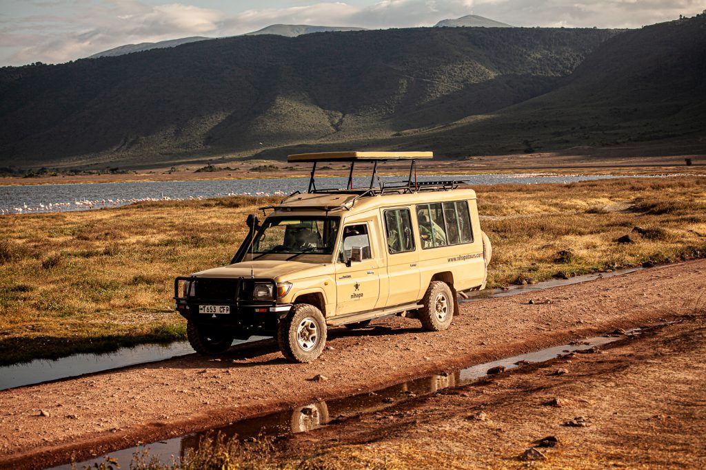 Nihapa Tours 4x4 safari vehicle inside Ngorongoro Crater during a Tanzania safari adventure through the world’s largest volcanic caldera.