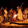Cultural dance beside a fire during a 10-Day Exclusive Tanzania Safari