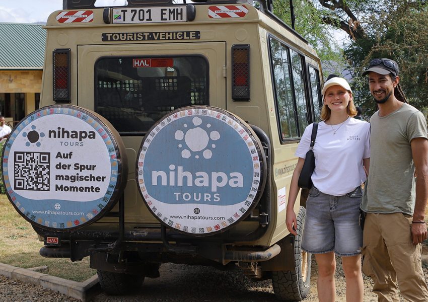 Visitors enjoying a guided game drive in a Nihapa Tours vehicle during an 11-Day Tanzania and Zanzibar Safari.